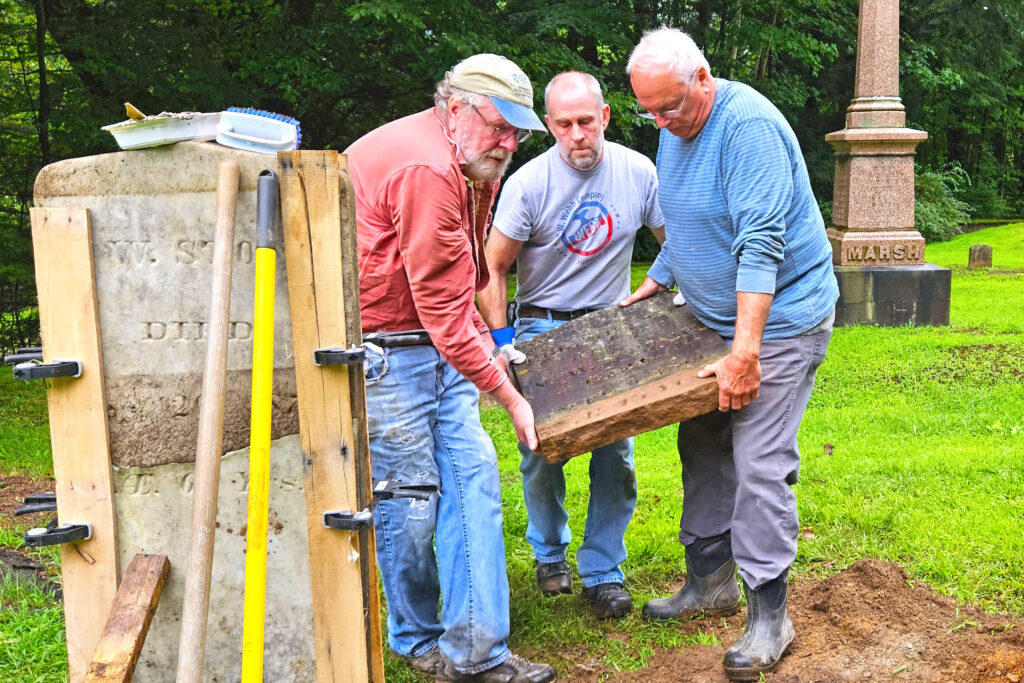 Tom Giffin, Dan Jacobs, Dave Newton repairing stones